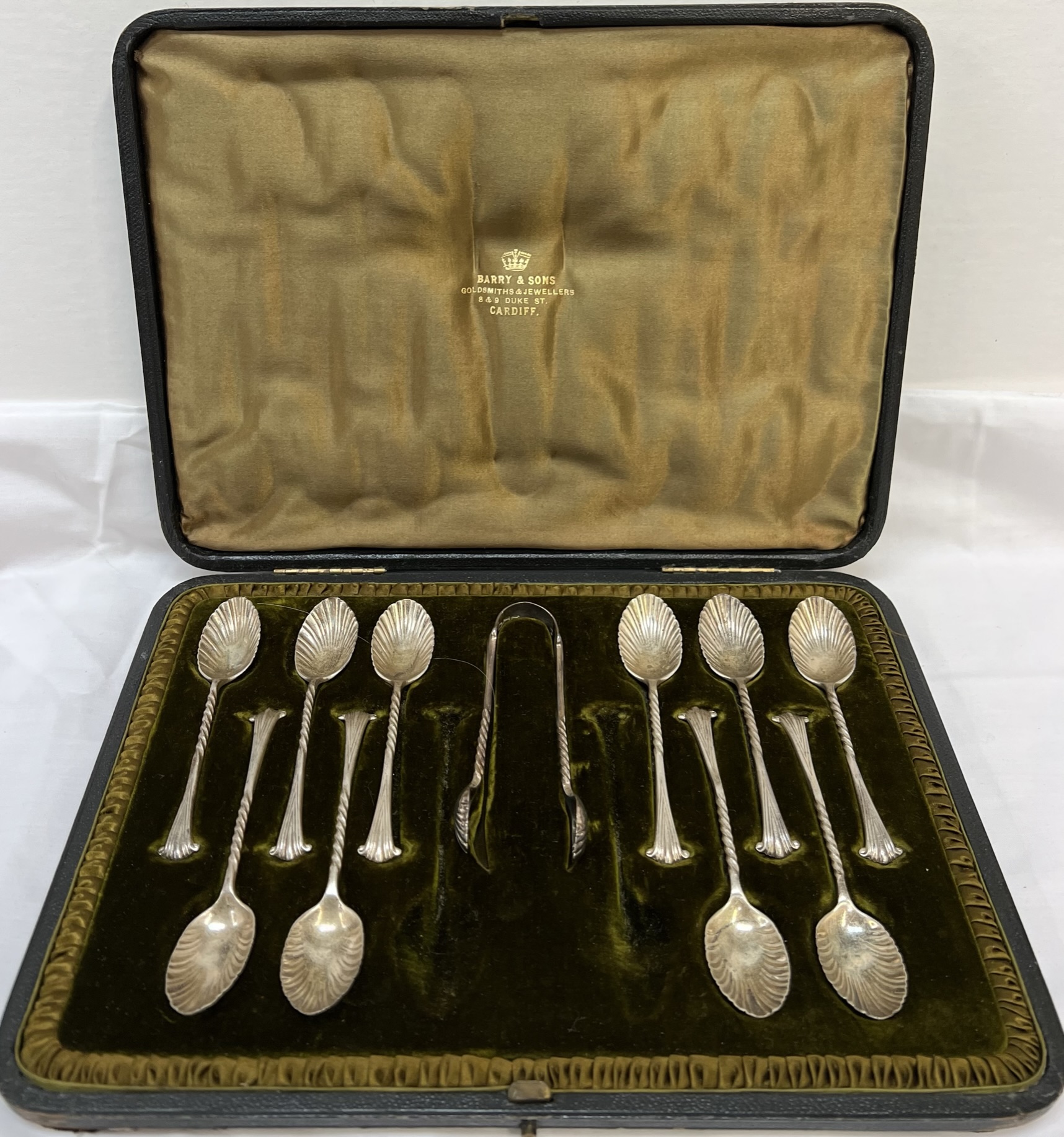 A late Victorian silver part teaspoon and sugar nips set,