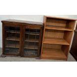 A mid 20th century teak bookcase together with an oak bookcase