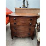 A 19th century mahogany commode in the form of a chest of drawers with a hinged top on splayed