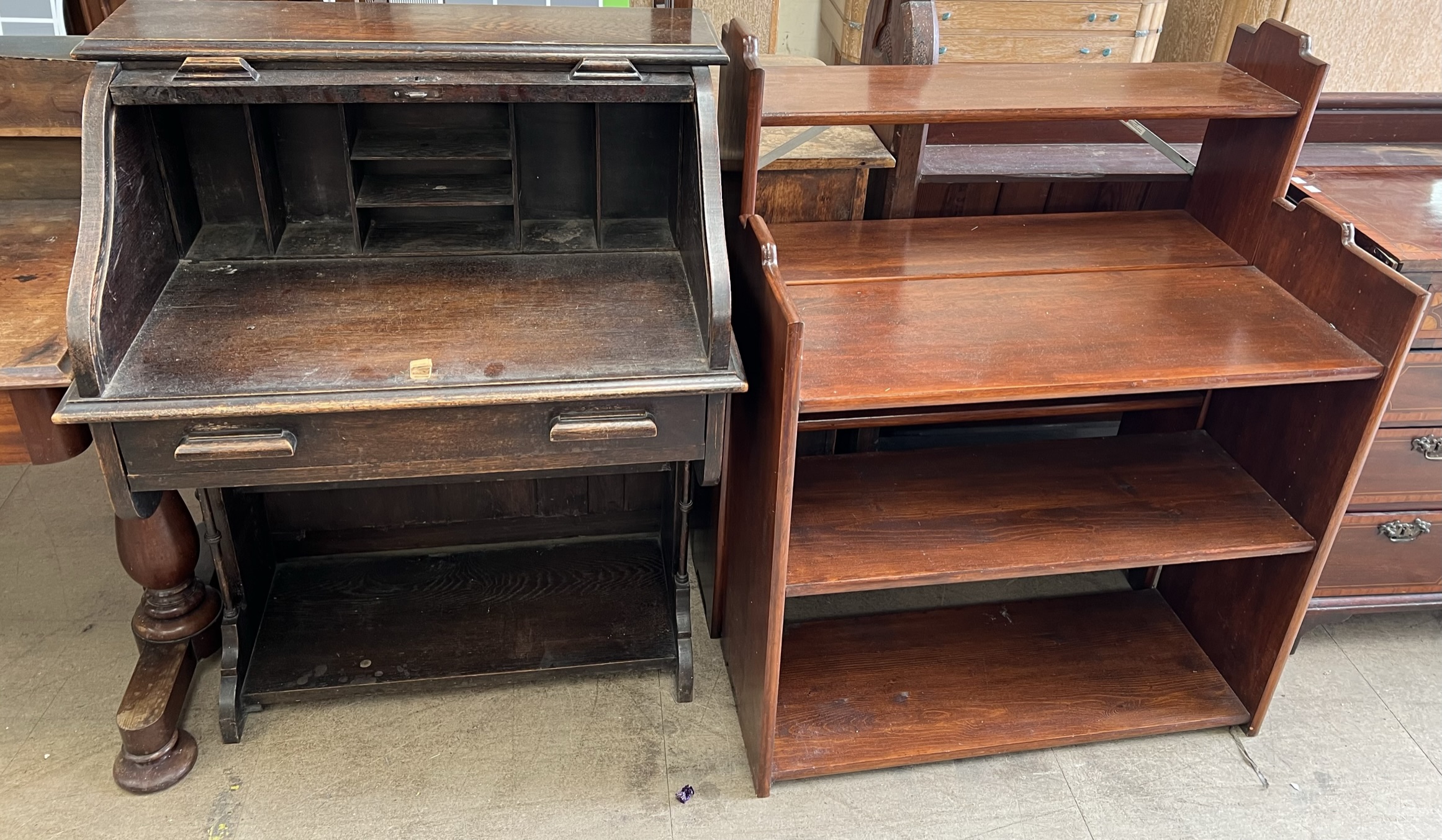An oak bureau together with a matched pair of mahogany bookcases