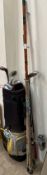 A golf bag together with Wilson golf clubs,