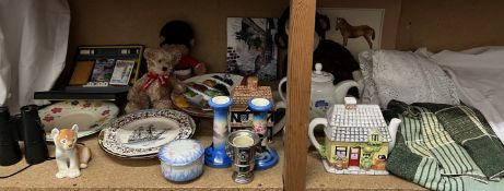 A Harrods teddy bear together with other teddy bears, novelty tea pots,