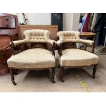 A pair of Edwardian horseshoe shaped chairs,