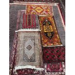 A Turkish rug, with an orange ground,