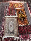 A Turkish rug, with an orange ground,