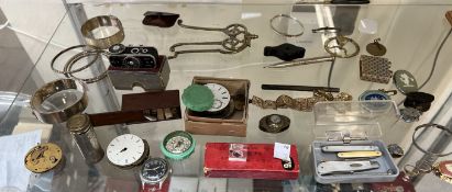 Bangles together with watch movements, pocket sundial, compass,