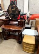 A Victorian mahogany Duchess dressing table with an oval mirror and drawers,