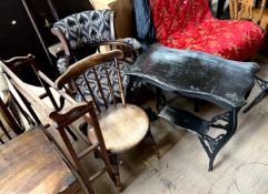 A horseshoe shaped captain's chair together with a stick back chair,