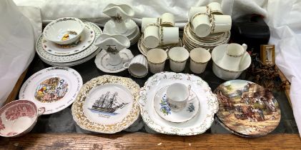 A part tea set together with collectors plates,