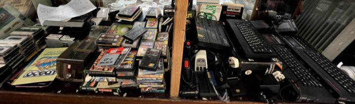 A large lot including assorted spectrum computers and accessories and games etc