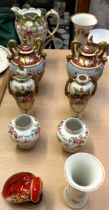 A pair of Vienna style twin handled vases together with continental porcelain vases,
