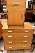 A Mid 20th century Stag light oak four drawer chest together with a matching bedside cabinet