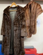 A fur coat together with a fur stole