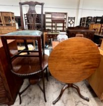 A 19th century mahogany tripod table together with a mahogany occasional table and a dining chair