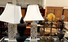 A pair of white painted table lamps of pierced column form together with two pairs of metal table