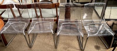 A set of four Ikea Tobias chair design transparent chrome plated chairs designed by Carl Ojerstam