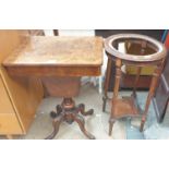 A Victorian burr walnut sewing table with a rectangular hinged top above a central well on four