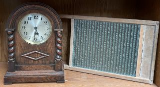 An oak cased mantle clock together with a washboard