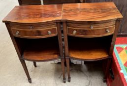 A pair of Edwardian mahogany bedside cabinets, with a slide,