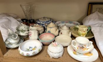 Shorter Chelsea pensioners jugs together with teapots,