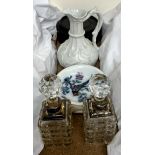 Two silver topped scent bottles together with a pottery jug,