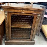 A Victorian walnut side cabinet with a rectangular top above a marquetry frieze and gilt metal