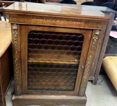 A Victorian walnut side cabinet with a rectangular top above a marquetry frieze and gilt metal