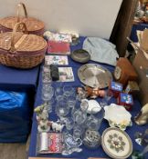 A pair of picnic baskets together with clocks,