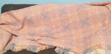 A Welsh blanket in pinks,