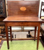 A 19th century mahogany tea table,