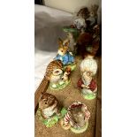 A collection of Beswick and Beswick Ware Beatrix potter gold back stamp figures including Mr