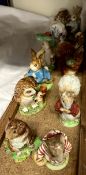 A collection of Beswick and Beswick Ware Beatrix potter gold back stamp figures including Mr