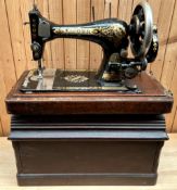 A Singer sewing machine contained in a case