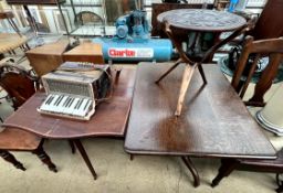 An oak tripod table together with an Edwardian mahogany Sutherland table,