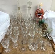 Glass decanters together with assorted drinking glasses,