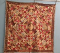 A modern patchwork quilt - A Jacob's Ladder quilt,