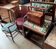 An oak chair with an upholstered back and seat together with a wicker chair,