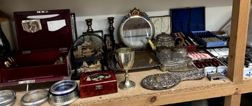 A stationary box with bone fitting together with a white metal mounted teapot, silver backed mirror,