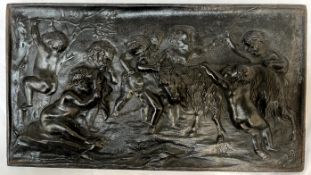 A cast iron plaque decorated with putti and a goat 36.