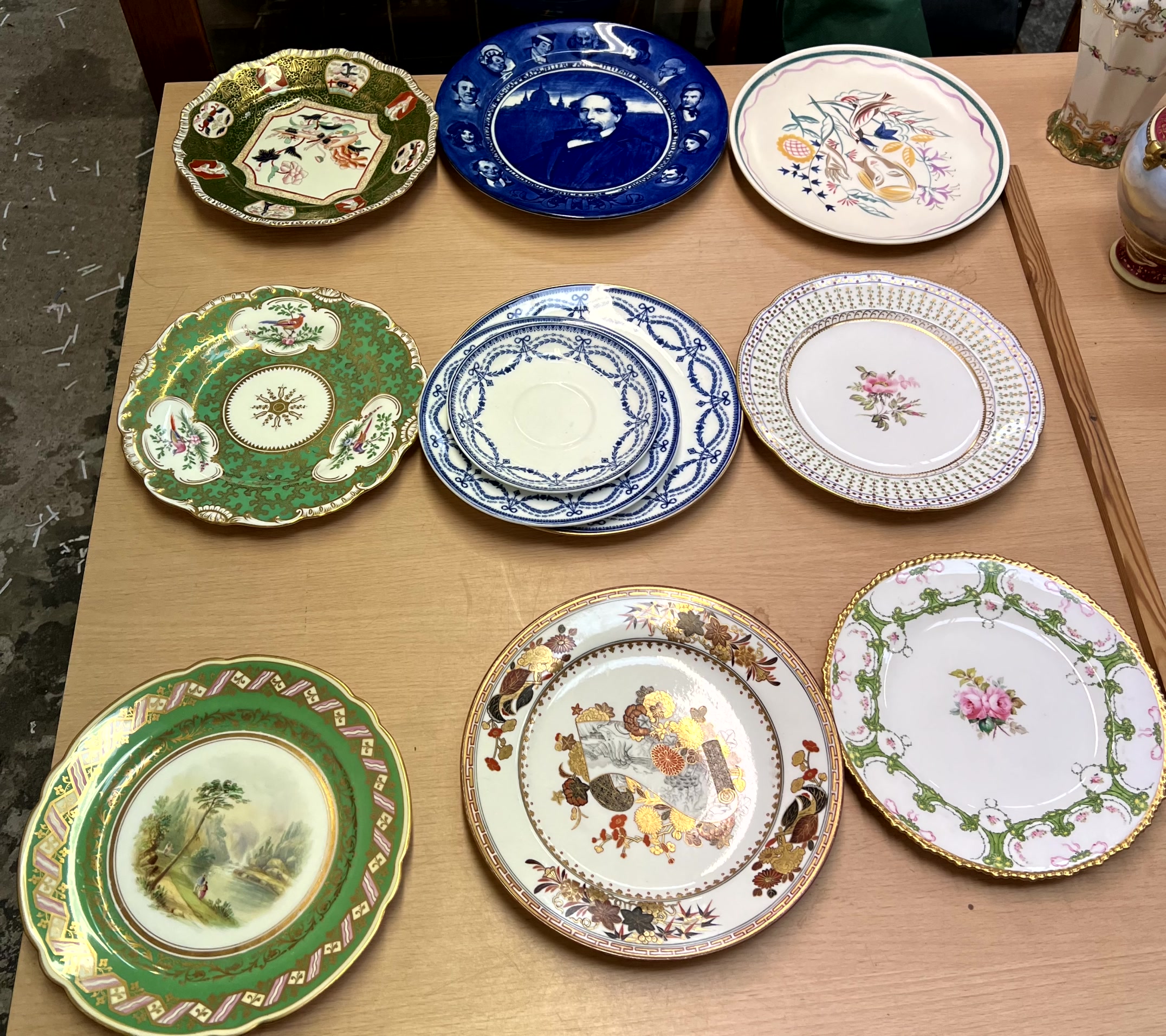 A Flight Barr & Barr plate together with floral painted plates,