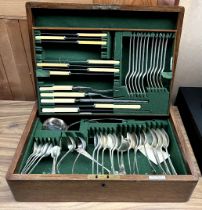 A Walker and Hall electroplated part flatware service contained within an oak box
