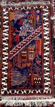 A rug with stylised buildings to a blue ground with geometric decorated guard stripes,