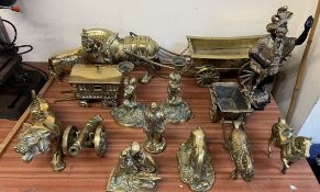 A collection of assorted brasswares including candlesticks, horses,