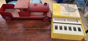 An early 20th century hand painted Triang Toys large tinplate red rail way train LMS on four rubber