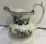 A Baker Bevan and Irwin pottery jug with monochrome decoration