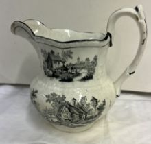 A Baker Bevan and Irwin pottery jug with monochrome decoration