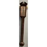 A 20th century stick barometer with an architectural pediment,