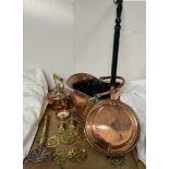 A copper coal scuttle together with a copper bedwarming pan, horse brasses, copper kettle,