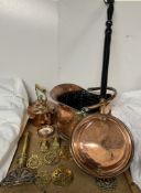 A copper coal scuttle together with a copper bedwarming pan, horse brasses, copper kettle,