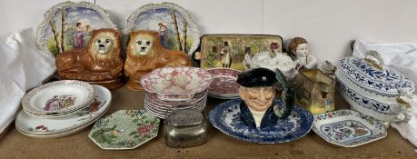 A pair of Staffordshire lions together with pottery plates, Royal Doulton Lobster Man D6617,